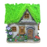 Whimsical Grass Roof Cottage